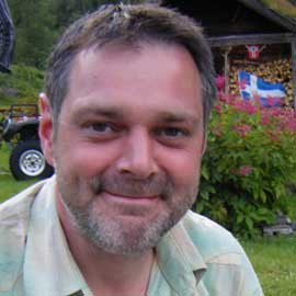 a man smiling for the camera