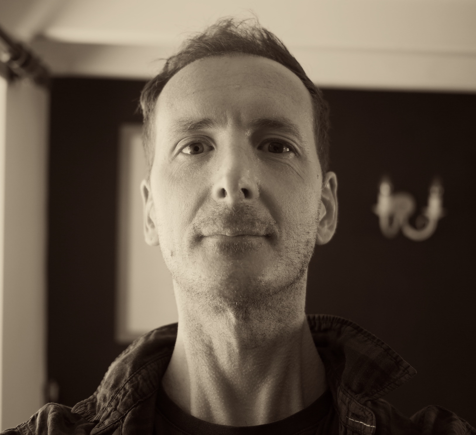 Man looking directly at camera - head shot