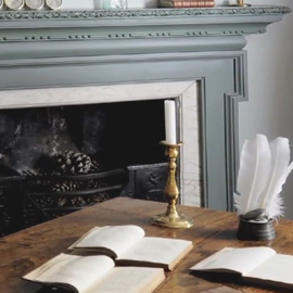 a fire place sitting in a room