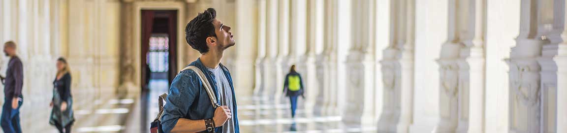 a person standing in front of a building