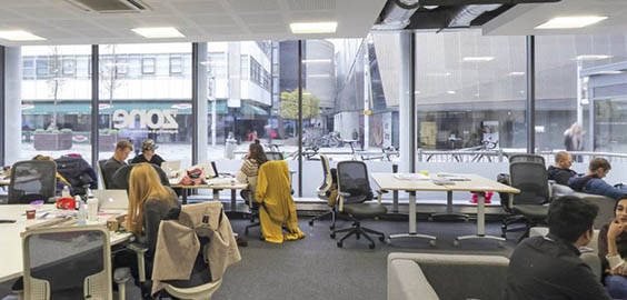 a group of people sitting at a table