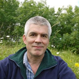 Man smiling academic