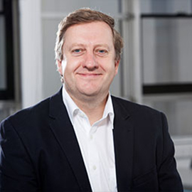 a man wearing a suit and tie