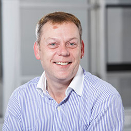 a man smiling for the camera