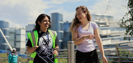 Image of two students smiling