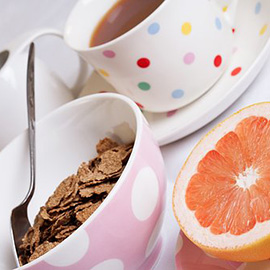 a bowl of fruit on a plate