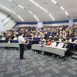 a large crowd of people in a room