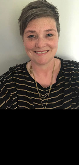 a woman smiling for the camera