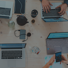 four laptops on desk