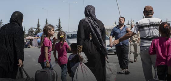 a group of people carrying luggage