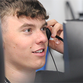 Caption:A member of staff answering a call on Northumbria's Clearing Hotline