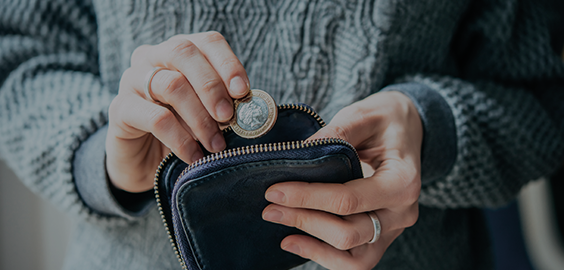 Image of a purse with a pound coin