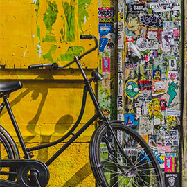 a bicycle parked in front of a building