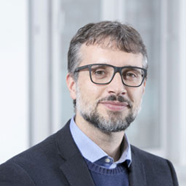 a man wearing a suit and tie