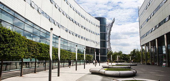 an empty parking lot in front of a building