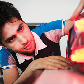 a man cutting food on a table
