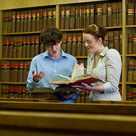 a group of people in a library