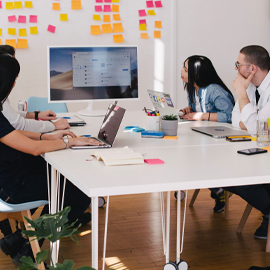 a group of people sitting at a table