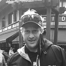 Academic staff Simon Scott- Harden wearing a hat